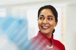 A woman smiling