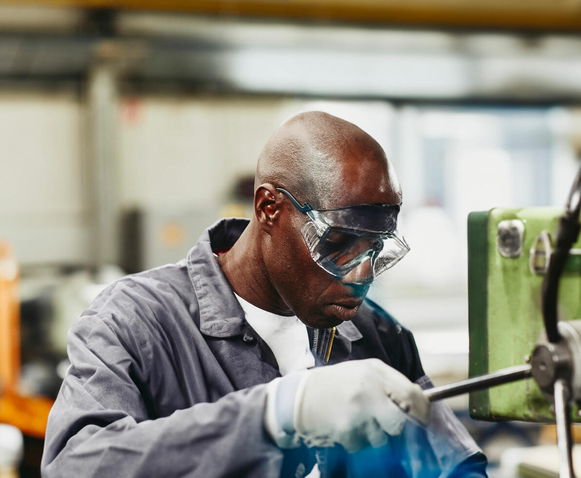 A man working with a tool