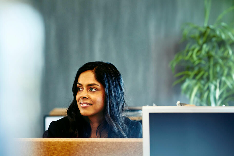Insurance professional in office.